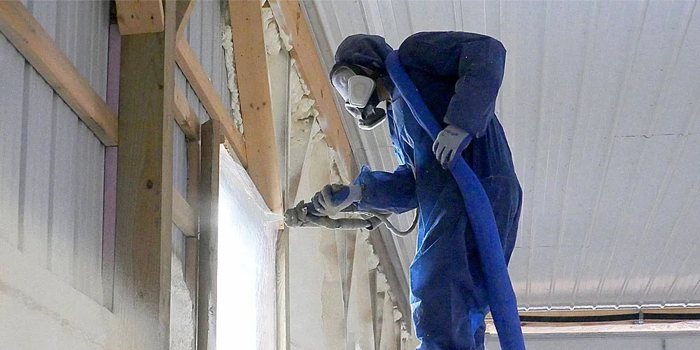 Spray foam insulation in an industrial building